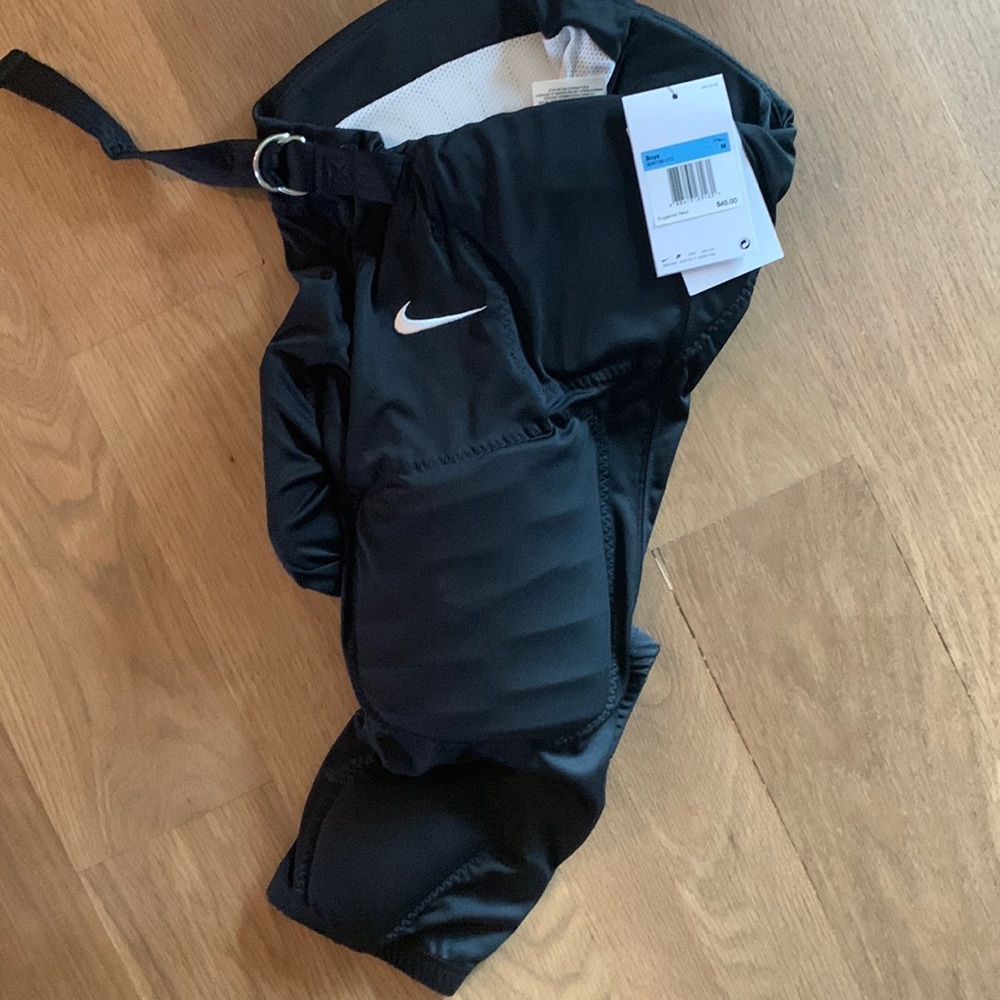 NEW Nike Youth size medium padded football pants
